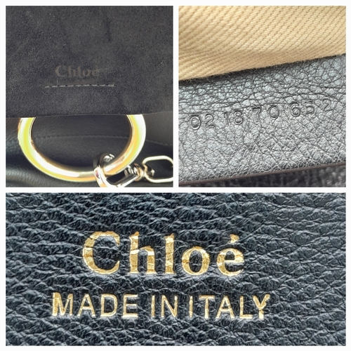 16 - A Chloe Faye Medium Backpack in Black and Suede. Black leather and suede exterior with gold-toned ha... 
