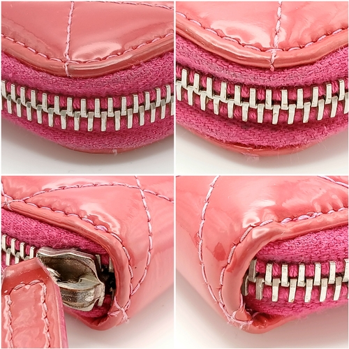 181 - A Chanel Pink Quilted Patent Leather Wallet. Pink quilted patent leather exterior with silver-tone h... 