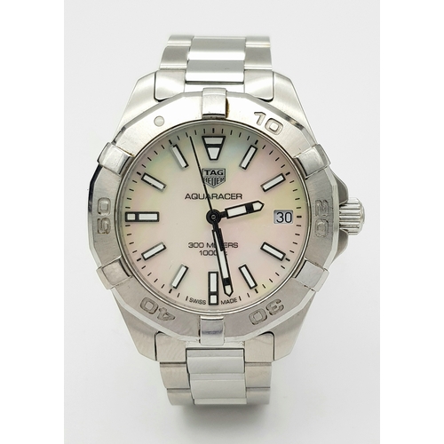 183 - A Tag Heuer Aquaracer, 300 Meters Quartz Ladies Watch. Stainless steel bracelet and case - 34mm. Mot... 