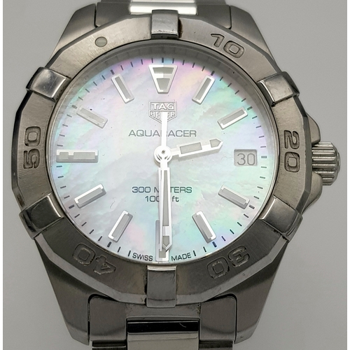 183 - A Tag Heuer Aquaracer, 300 Meters Quartz Ladies Watch. Stainless steel bracelet and case - 34mm. Mot... 