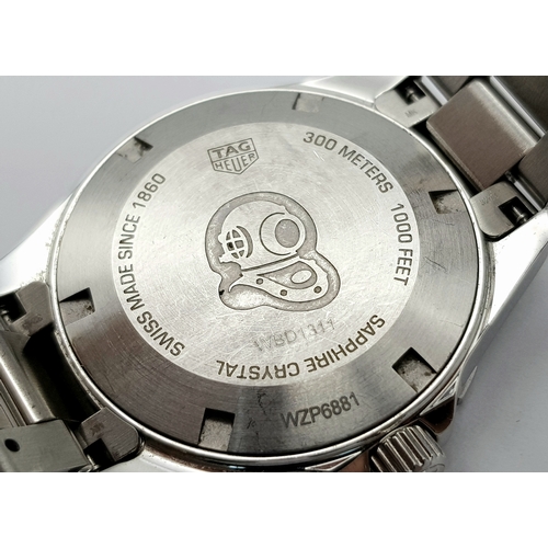 183 - A Tag Heuer Aquaracer, 300 Meters Quartz Ladies Watch. Stainless steel bracelet and case - 34mm. Mot... 