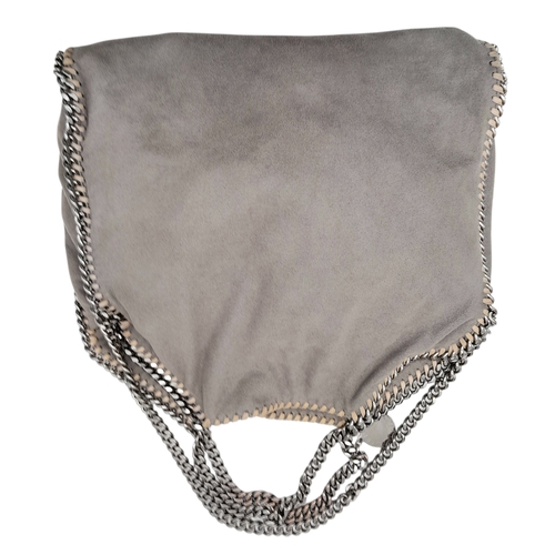 195 - A Stella McCartney Falabella Fold-Over Tote Bag. Grey faux suede exterior with silver-toned hardware... 
