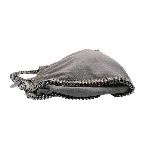 195 - A Stella McCartney Falabella Fold-Over Tote Bag. Grey faux suede exterior with silver-toned hardware... 