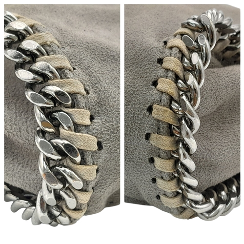 195 - A Stella McCartney Falabella Fold-Over Tote Bag. Grey faux suede exterior with silver-toned hardware... 