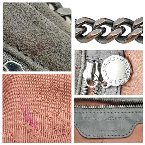 195 - A Stella McCartney Falabella Fold-Over Tote Bag. Grey faux suede exterior with silver-toned hardware... 