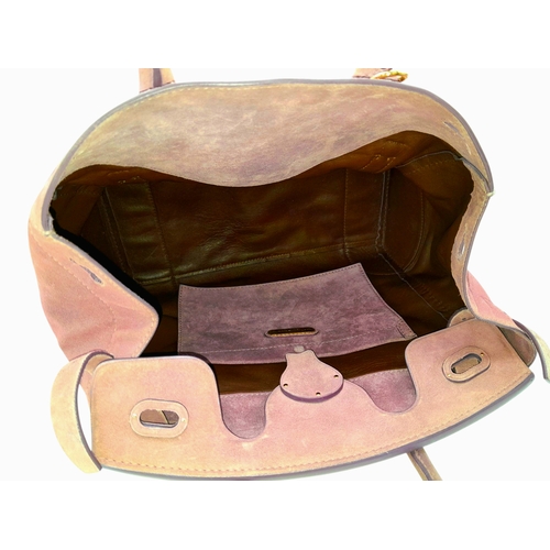 201 - A Ralph Lauren Pink Suede Tote Bag. Pink suede exterior with gold-toned hardware, rolled top handles... 