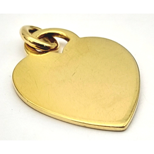 22 - A TIFFANY & CO 18K YELLOW GOLD HEART PENDANT/CHARM. 6.7G, 3cm LENGTH. Ref: SC 2095