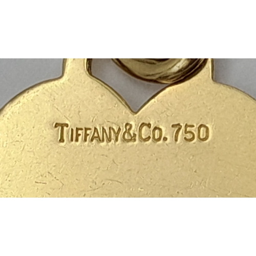 22 - A TIFFANY & CO 18K YELLOW GOLD HEART PENDANT/CHARM. 6.7G, 3cm LENGTH. Ref: SC 2095