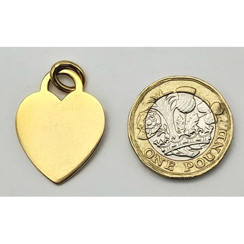 22 - A TIFFANY & CO 18K YELLOW GOLD HEART PENDANT/CHARM. 6.7G, 3cm LENGTH. Ref: SC 2095