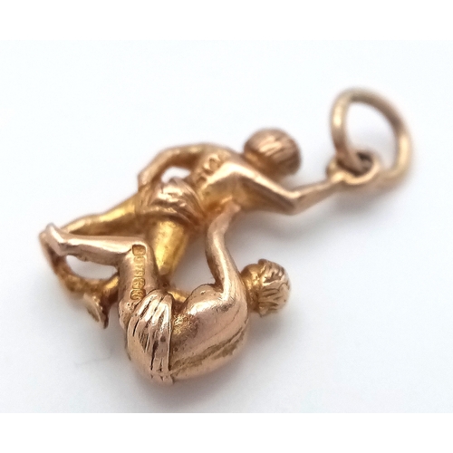 221 - A 9K YELLOW GOLD GEMINI ZODIAC SIGN CHARM/PENDANT. 3G, 23mm LENGTH. Ref: SC 2062