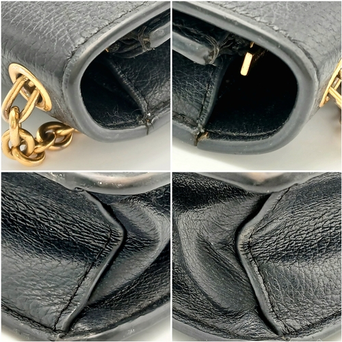 222 - A Mulberry Black Grained Leather Darley Wallet Envelope Crossbody Bag. Black leather exterior with g... 