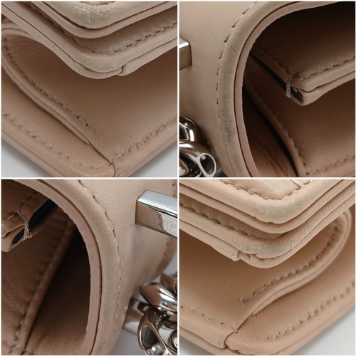 229 - A Christian Dior Beige Leather Diorama Flap Bag. Beige leather exterior with silver-toned hardware. ... 