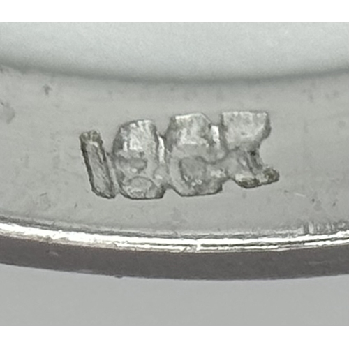 237 - An 18k White Gold Diamond Solitaire Ring. 0.30ct round brilliant cut diamond - Slightly champagne ti... 