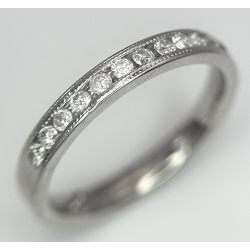 242 - AN 18K WHITE GOLD DIAMOND HALF ETERNITY RING WITH BEVELLED EDGES. 0.25CTW, 2.4G TOTAL WEIGHT. SIZE F... 