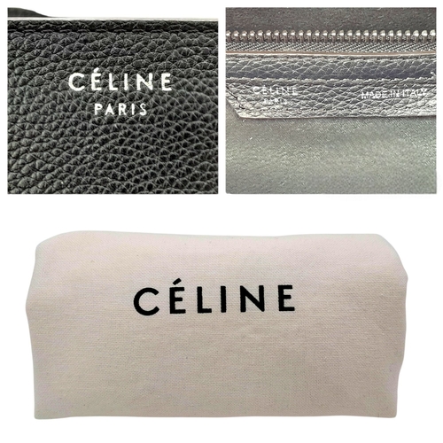 251 - A Céline Black Pebbled Leather Luggage Tote Bag. Black leather exterior with silver-toned hardware, ... 