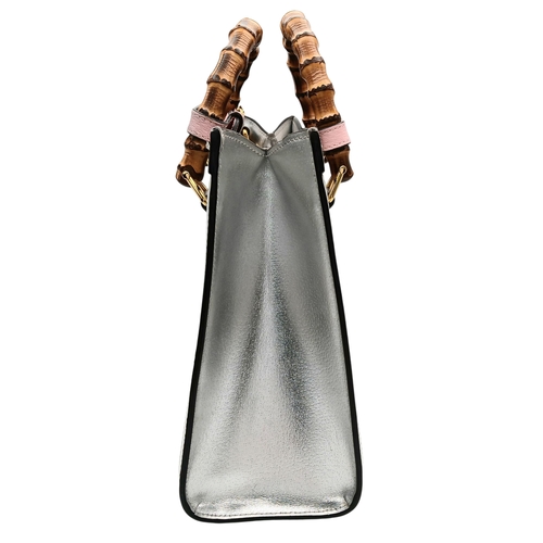265 - A Gucci Diana Metallic Silver Leather Bamboo Handle Tote Bag. Metallic silver leather exterior with ... 