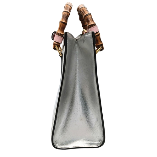 265 - A Gucci Diana Metallic Silver Leather Bamboo Handle Tote Bag. Metallic silver leather exterior with ... 