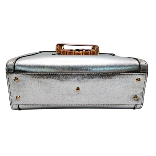 265 - A Gucci Diana Metallic Silver Leather Bamboo Handle Tote Bag. Metallic silver leather exterior with ... 