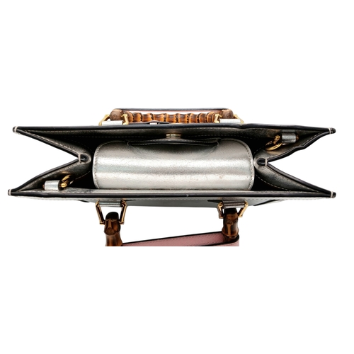 265 - A Gucci Diana Metallic Silver Leather Bamboo Handle Tote Bag. Metallic silver leather exterior with ... 