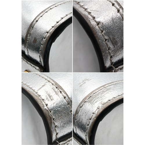 265 - A Gucci Diana Metallic Silver Leather Bamboo Handle Tote Bag. Metallic silver leather exterior with ... 