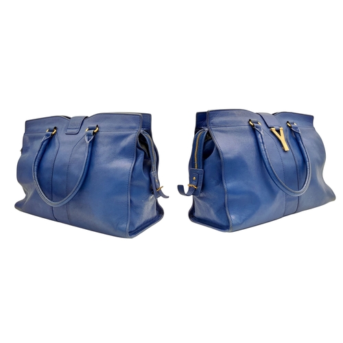 272 - A Yves Saint Laurent Cabas Chyc Tote Bag. Blue leather exterior with gold-toned hardware and zipped ... 