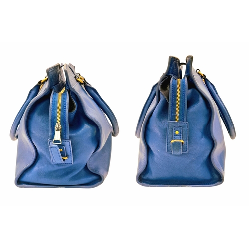 272 - A Yves Saint Laurent Cabas Chyc Tote Bag. Blue leather exterior with gold-toned hardware and zipped ... 