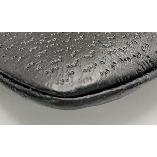 279 - A Gucci Black Canvas and Leather Bamboo-Top Handle Handbag. Black canvas exterior with bamboo-style ... 