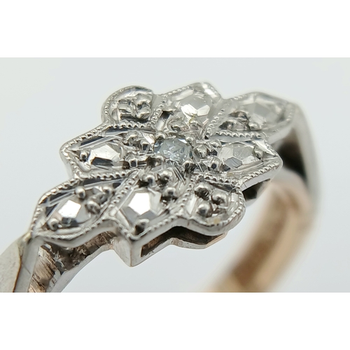 302 - A 9K YELLOW GOLD AND PLATINUM VINTAGE DIAMOND RING. 2.5G TOTAL WEIGHT, SIZE L. Ref: SC 2003