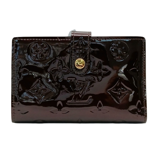 313 - A Louis Vuitton Vernis Amarante Monogram Purse. Dark burgundy patent leather exterior with gold-tone... 