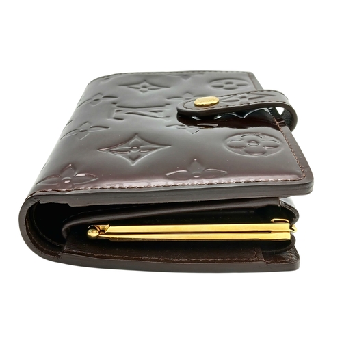 313 - A Louis Vuitton Vernis Amarante Monogram Purse. Dark burgundy patent leather exterior with gold-tone... 