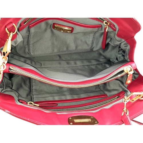 348 - A Miu Miu Matelassé Leather Shoulder Bag. Light purple leather exterior with gold-toned hardware, du... 