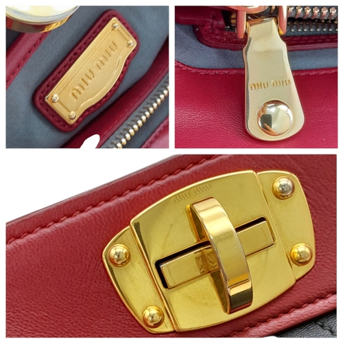 348 - A Miu Miu Matelassé Leather Shoulder Bag. Light purple leather exterior with gold-toned hardware, du... 