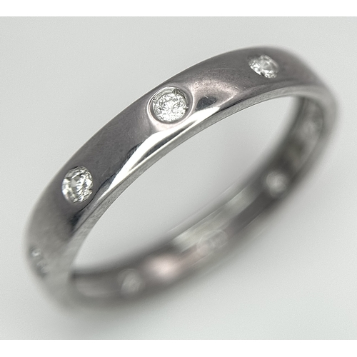361 - AN 18K WHITE GOLD DIAMOND SET BAND RING. 1.7G TOTAL WEIGHT, SIZE L. Ref: SC 2087