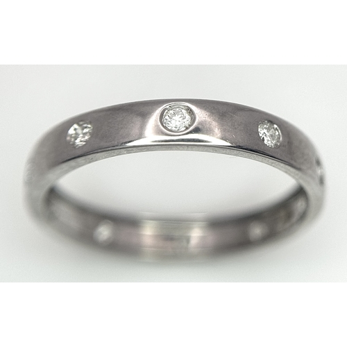361 - AN 18K WHITE GOLD DIAMOND SET BAND RING. 1.7G TOTAL WEIGHT, SIZE L. Ref: SC 2087