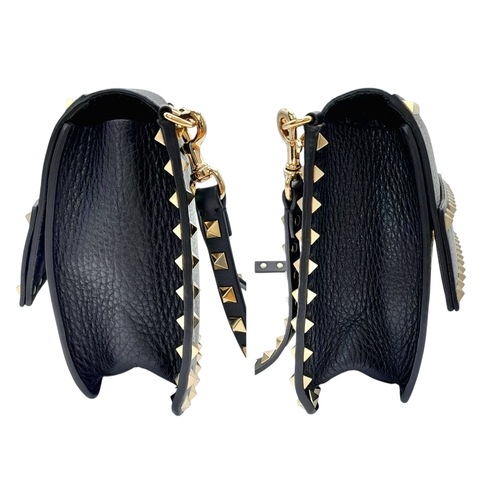 44 - A Valentino Garavani Black Rockstud Crossbody Bag. Black leather exterior with gold-tone hardware, d... 