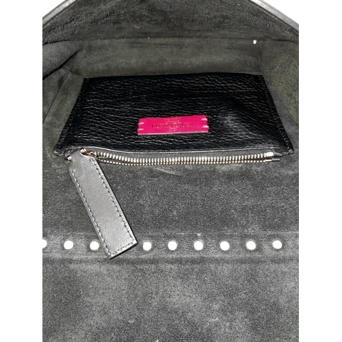 44 - A Valentino Garavani Black Rockstud Crossbody Bag. Black leather exterior with gold-tone hardware, d... 