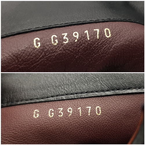 300 - A pair of Chanel Calfskin Chain High Boots. Size 38 1/2. Black leather exterior with round toes, sma... 