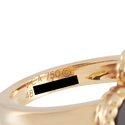 225 - An 18K Yellow Gold Van Cleef & Arpels  Alhambra Onyx Diamond Ring. The ring is designed with a polis... 