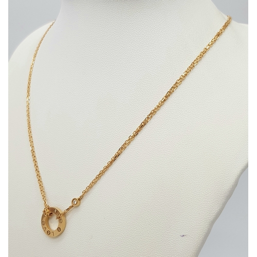 205 - A Bulgari 18K Gold Diamond Necklace and Pendant. Set with two round brilliant cut diamonds. Pendant ... 