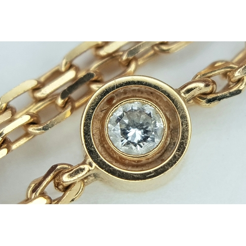 205 - A Bulgari 18K Gold Diamond Necklace and Pendant. Set with two round brilliant cut diamonds. Pendant ... 