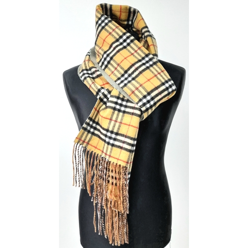 211 - A Burberry Wool Cashmere House Check Fringe Scarf in Camel and Green. Featuring Burberry’s classic c... 