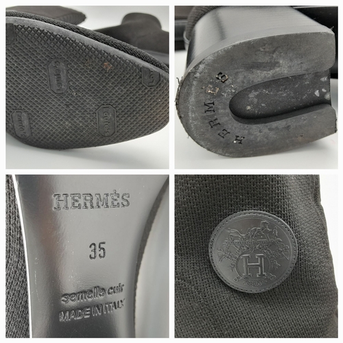 226 - A pair of Hermes knit calfskin Fontaine 60 Boots. size 35. Black knit exterior with leather accents ... 