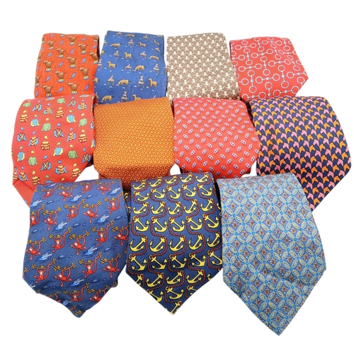 236 - Eleven Hermès Silk Ties. In good condition overall, one blue camel tie has a light stain - but pleas... 