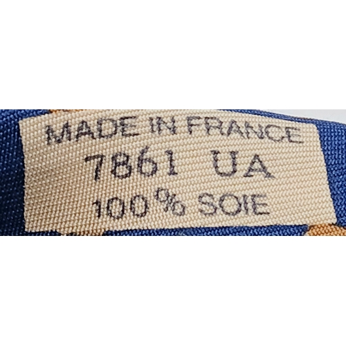 236 - Eleven Hermès Silk Ties. In good condition overall, one blue camel tie has a light stain - but pleas... 