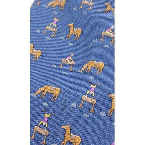 236 - Eleven Hermès Silk Ties. In good condition overall, one blue camel tie has a light stain - but pleas... 