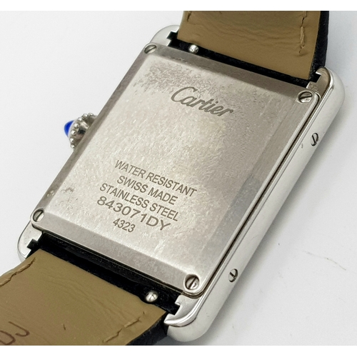 240 - A Cartier, Must de Cartier, Ladies Tank Watch. Model 4323. Black leather strap. Stainless steel cas... 