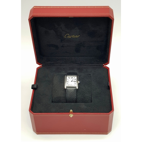 240 - A Cartier, Must de Cartier, Ladies Tank Watch. Model 4323. Black leather strap. Stainless steel cas... 