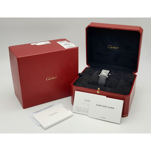 240 - A Cartier, Must de Cartier, Ladies Tank Watch. Model 4323. Black leather strap. Stainless steel cas... 