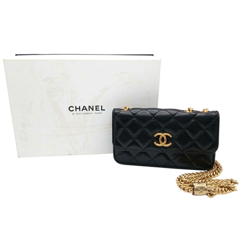 249 - A Chanel Dynasty Phone Holder Crossbody Bag. Black diamond-quilted lambskin leather exterior, gold-t... 