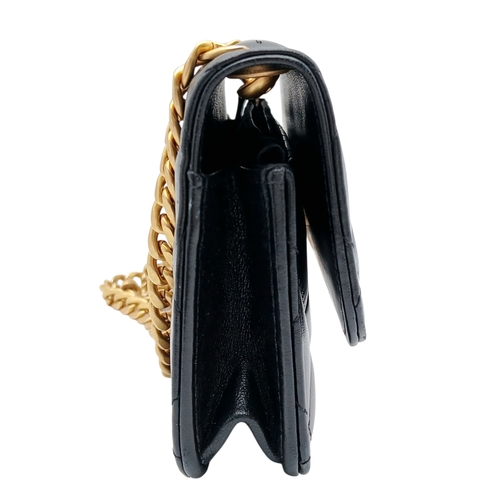 249 - A Chanel Dynasty Phone Holder Crossbody Bag. Black diamond-quilted lambskin leather exterior, gold-t... 